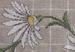 Dise&ntilde;os de flores en punto cruz